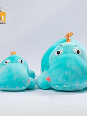 Gấu bông khủng long nằm mắt lòi