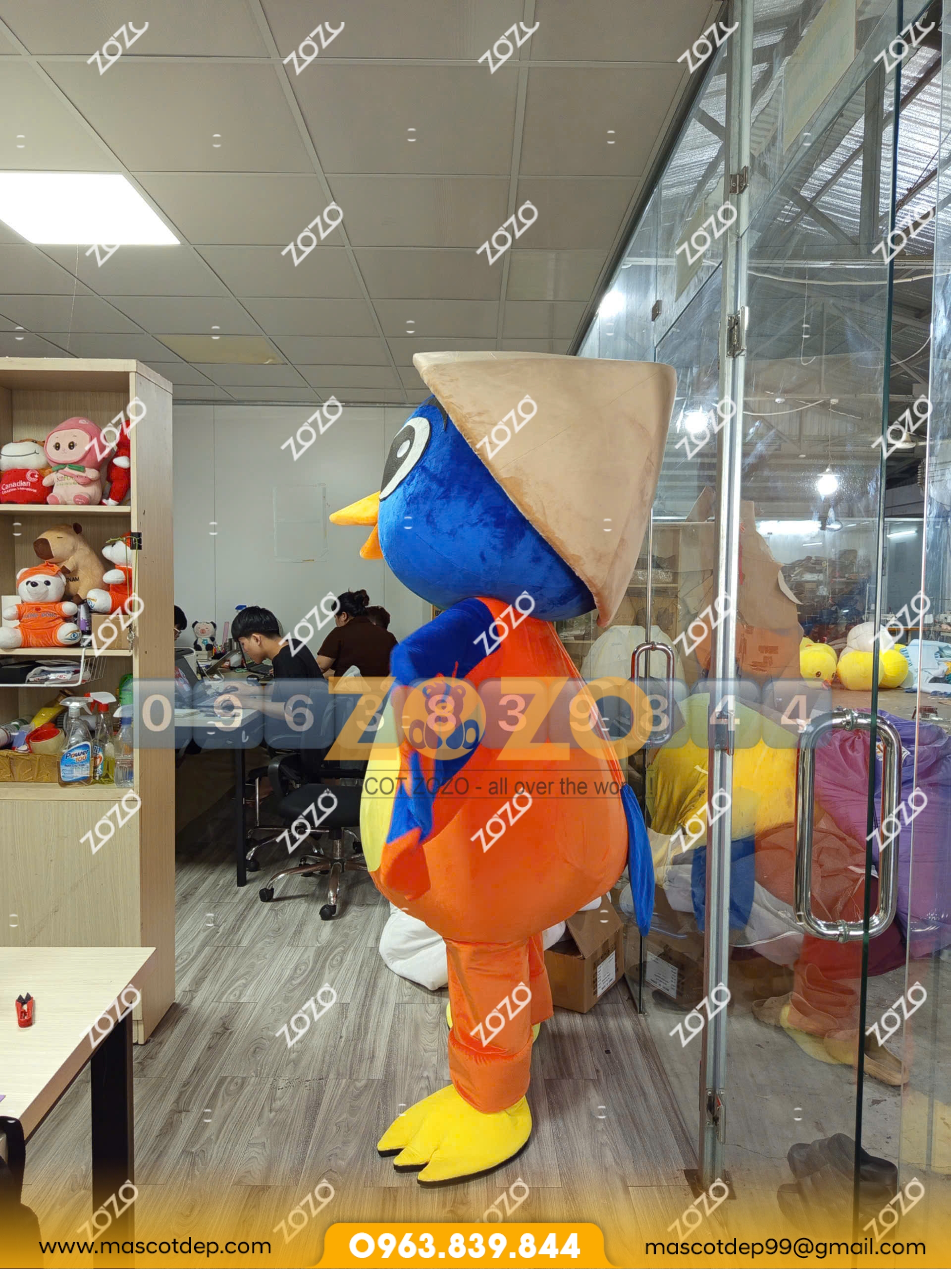 Mascot chim DMC mặt hông 1 Mascot chim DMC mặt hông 1